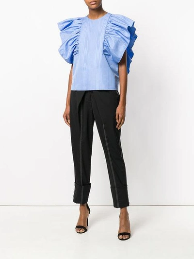 Shop Msgm Oversized Ruffle Blouse In Blue