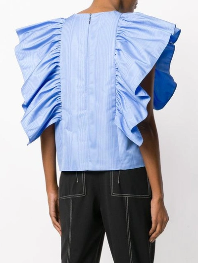 Shop Msgm Oversized Ruffle Blouse In Blue
