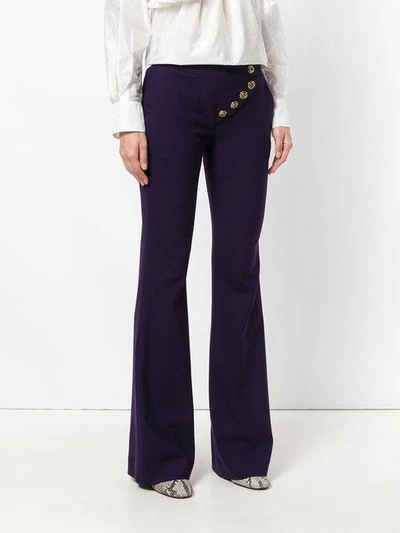 Shop Chloé Asymmetric Flared Trousers - Purple In Pink & Purple