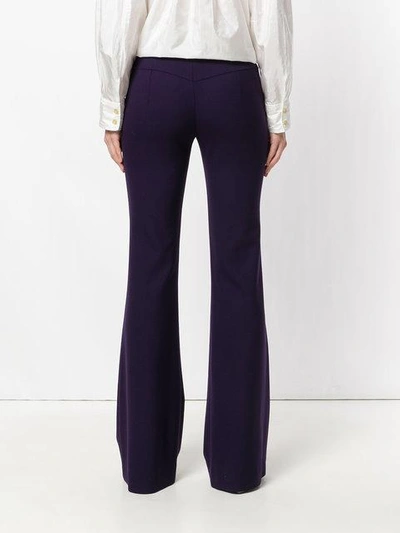 Shop Chloé Asymmetric Flared Trousers - Purple In Pink & Purple