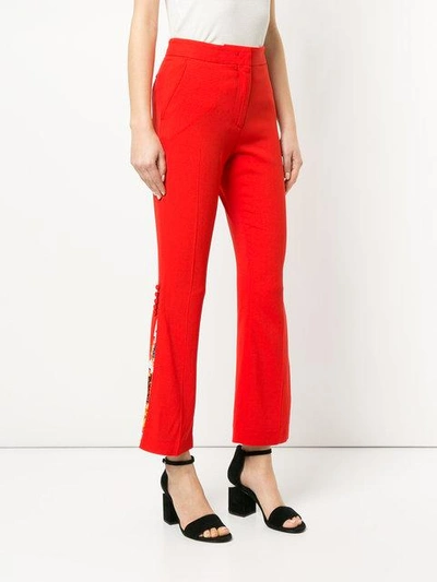 Shop Msgm Floral Panel Tailored Trousers In Red