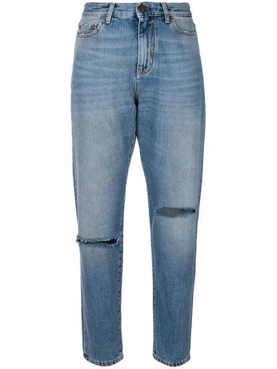 Shop Saint Laurent Ripped Knee Baggy Jeans In Blue