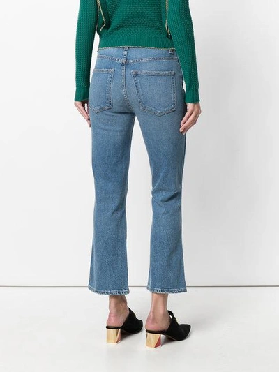 Shop Khaite Benny Kick Flare Jeans In Blue