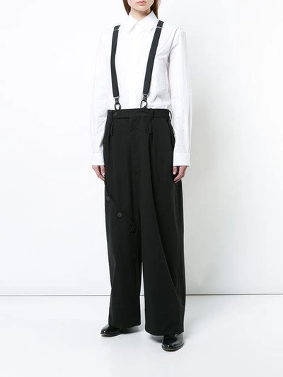 Shop Yohji Yamamoto Oversized Suspender Trousers - Black