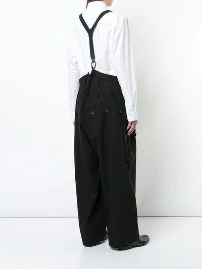 Shop Yohji Yamamoto Oversized Suspender Trousers - Black