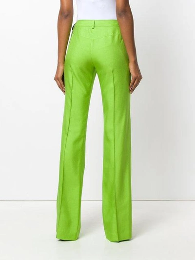 Shop Talbot Runhof Pleated Flared Trousers - Green