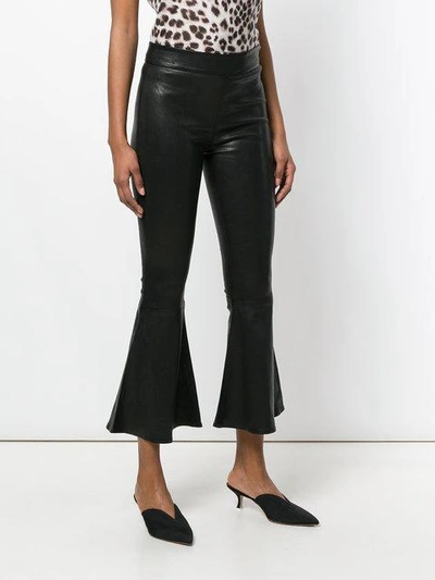 Shop Frame Flared Hem Trousers In Black