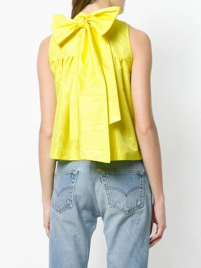 Shop Msgm Bow Top In Yellow