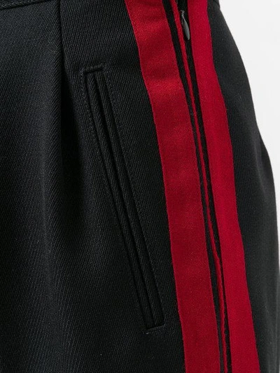 Shop Maison Margiela Striped Side Band Trousers - Black
