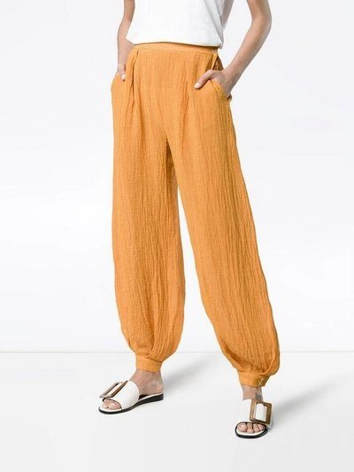 Shop Three Graces Hilda Harem Silk Pants - Yellow & Orange