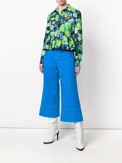 Shop Msgm Cropped Flare Jeans In Blue