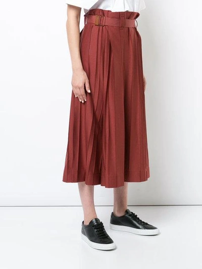 Shop Issey Miyake Drop Crotch Pleated Trousers In Red