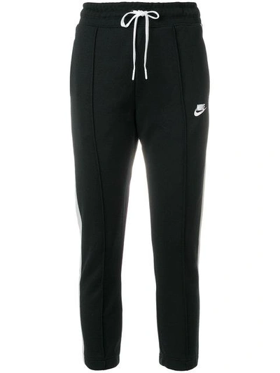 Shop Nike Logo Print Track Pants