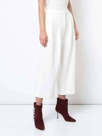 Shop Adam Lippes Mid-rise Pleated Culottes In White