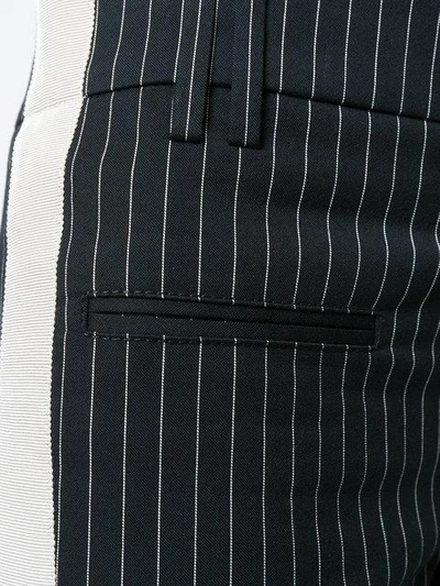 Shop Haider Ackermann Slim Pinstriped Trousers In Black