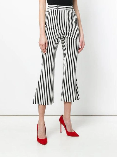 Shop Dolce & Gabbana Flared Striped Cropped Trousers In White