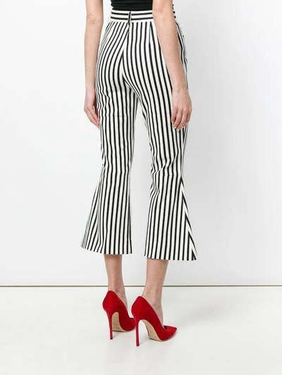 Shop Dolce & Gabbana Flared Striped Cropped Trousers In White