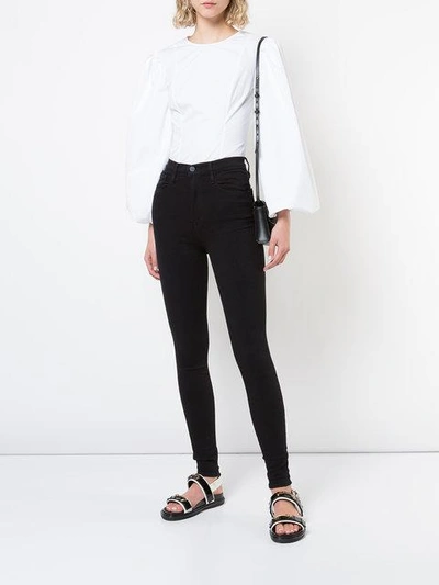 Shop Frame High-rise Skinny Jeans - Black