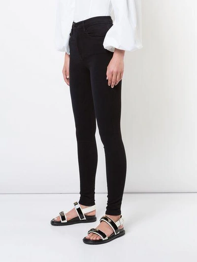 Shop Frame High-rise Skinny Jeans - Black