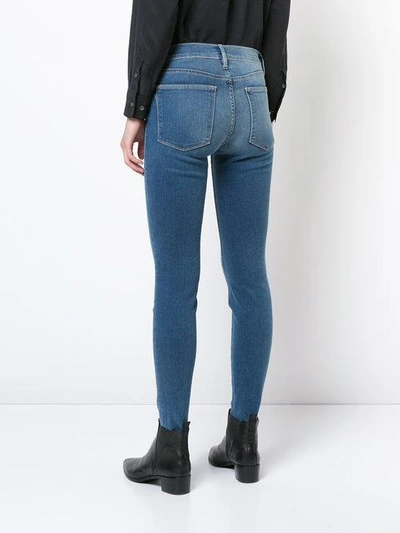 Shop Frame High Waisted Skinny Jeans In Blue
