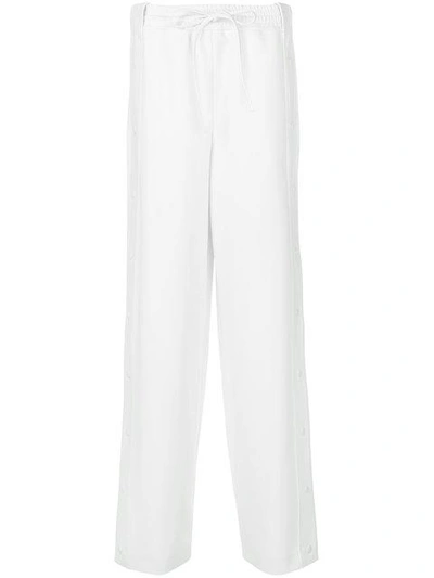 Shop Valentino Palazzo Track Pants In White