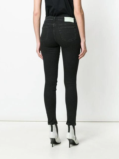 Shop Off-white Skinny Distressed Jeans In Black