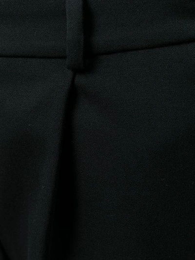 Shop Mugler Flared Trousers In Black
