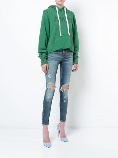 Shop Amiri Thrasher Skinny Jeans In Medium Indigo