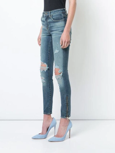 Shop Amiri Thrasher Skinny Jeans In Medium Indigo