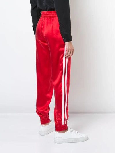 Shop Amiri Side-stripe Track Pants - Red