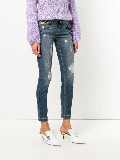 Shop Dolce & Gabbana Button Embellished And Brocade Appliqué Distressed Jeans - Blue