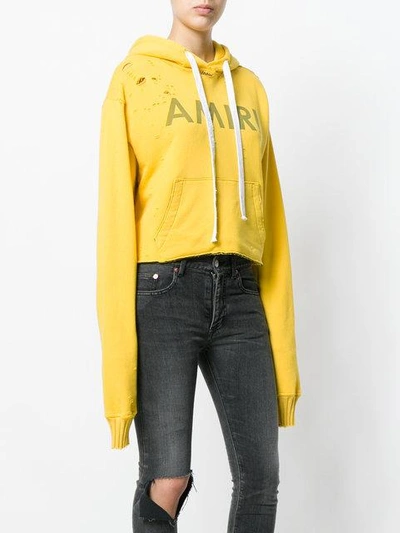 Shop Amiri Logo Print Cropped Hoodie - Yellow