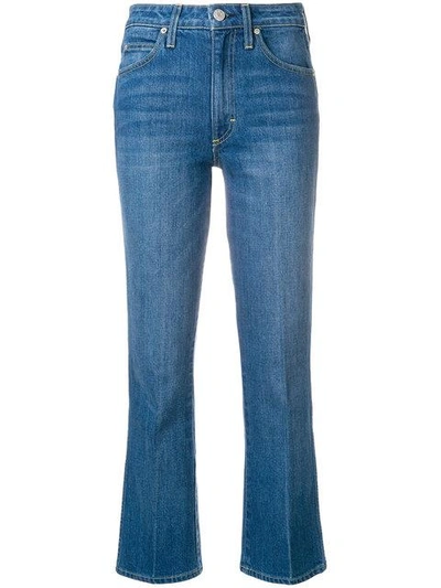 Shop Amo Flared Cropped Jeans In Blue