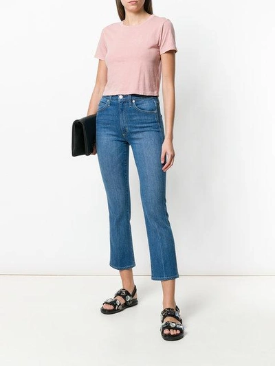 Shop Amo Flared Cropped Jeans In Blue