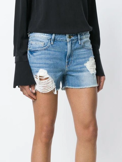 Shop Frame Distressed Shorts In Blue