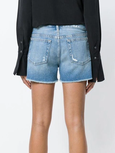 Shop Frame Distressed Shorts In Blue