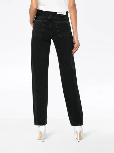 Shop Off-white Front Zip Slim Leg Jeans - Black