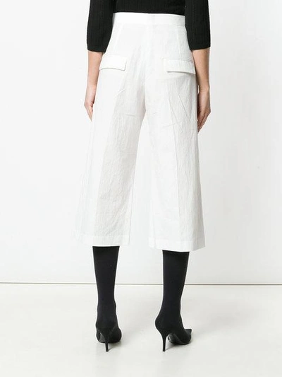 Shop Neil Barrett Cropped Straight-fit Trousers - White