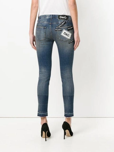 Shop Dolce & Gabbana Ripped Skinny Jeans In Blue