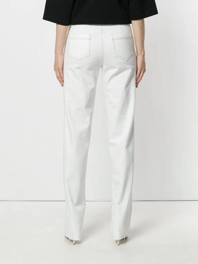 Shop Cristina Savulescu Pearl String Front Slim Fit Jeans - White