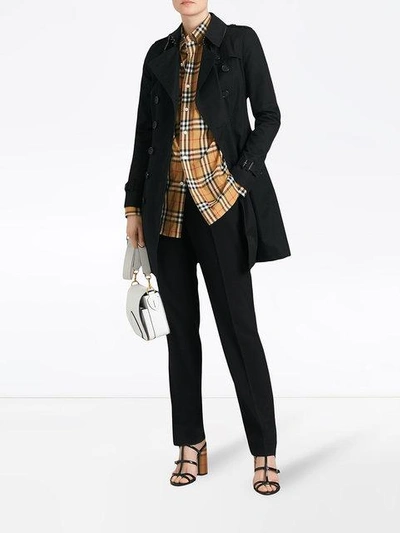 Shop Burberry The Chelsea Mid-length Trench Coat In Black