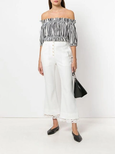 Shop Proenza Schouler Flared Cropped Trousers In White