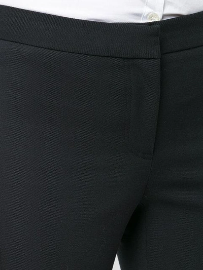 Shop Alexander Mcqueen Cropped Zip Trousers In Black