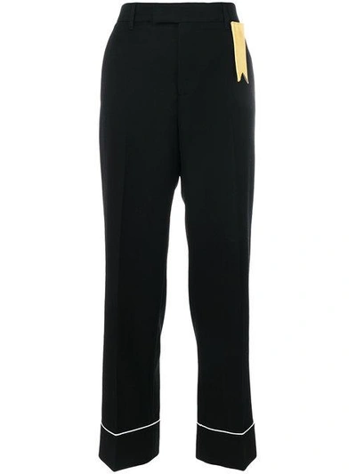 Shop The Gigi Contrast Piping Trousers In Black