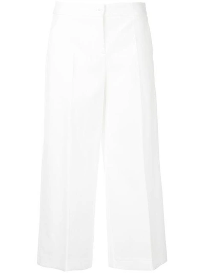 Shop Boutique Moschino Cropped Wide Leg Trousers In White