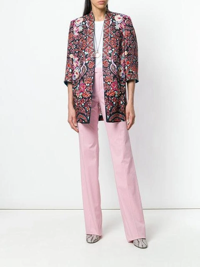 Shop Etro Flared Trousers - Pink & Purple