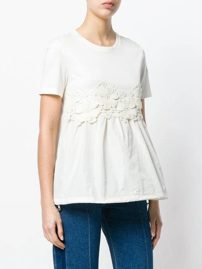 Shop Moncler Floral-embroidered Flared T-shirt - Neutrals