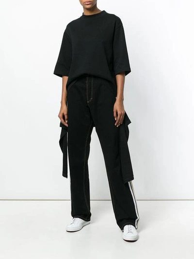 Shop Koché Wide Leg Jeans In Black