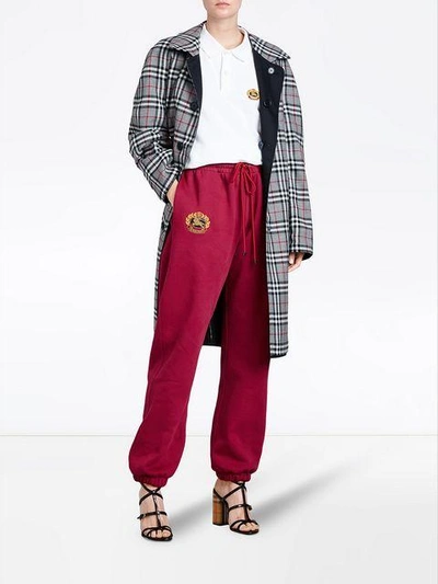 Shop Burberry Embroidered Logo Jersey Sweatpants In Red