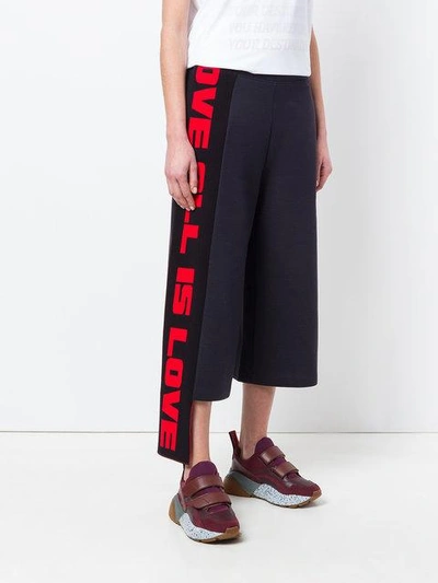 Shop Stella Mccartney Cropped Flared Trousers In Blue